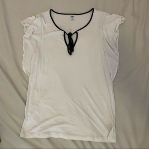 White blouse with black bow